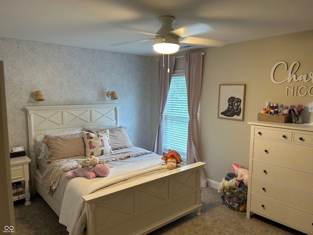 12059 Chapelwood Dr, Fishers, IN 46037 - carpeted bedroom with a ceiling fan and wallpapered walls