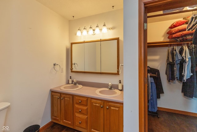 9437 N County Road 225 E, Pittsboro, IN 46167 - bathroom featuring double vanity and a walk in closet
