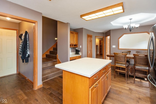 9437 N County Road 225 E, Pittsboro, IN 46167 - kitchen with dark wood-style floors, a chandelier, light countertops, and freestanding refrigerator