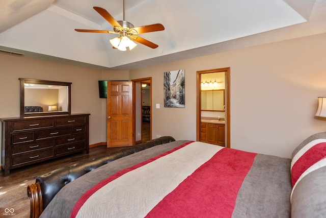 9437 N County Road 225 E, Pittsboro, IN 46167 - bedroom featuring dark wood-type flooring, ensuite bathroom, a raised ceiling, and a ceiling fan