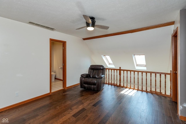 9437 N County Road 225 E, Pittsboro, IN 46167 - sitting room featuring wood finished floors, ceiling fan, lofted ceiling, a textured ceiling, and a skylight