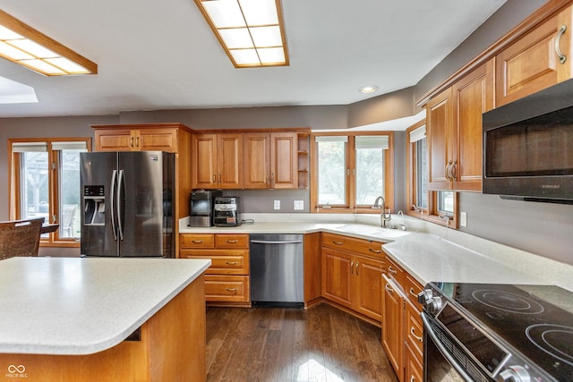 9437 N County Road 225 E, Pittsboro, IN 46167 - kitchen featuring appliances with stainless steel finishes, recessed lighting, dark wood-style flooring, brown cabinets, and light countertops