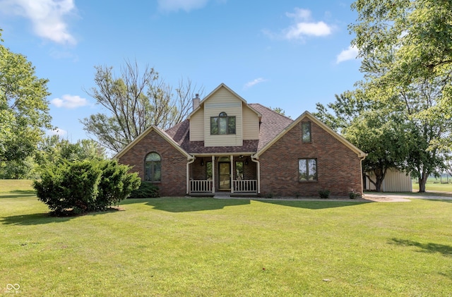 9437 N County Road 225 E, Pittsboro, IN 46167 - traditional-style house featuring brick siding, a front lawn, and a chimney