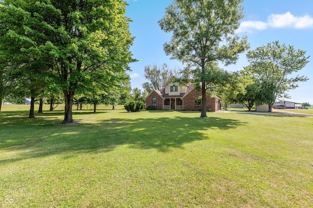 9437 N County Road 225 E, Pittsboro, IN 46167 - view of green lawn with a garage