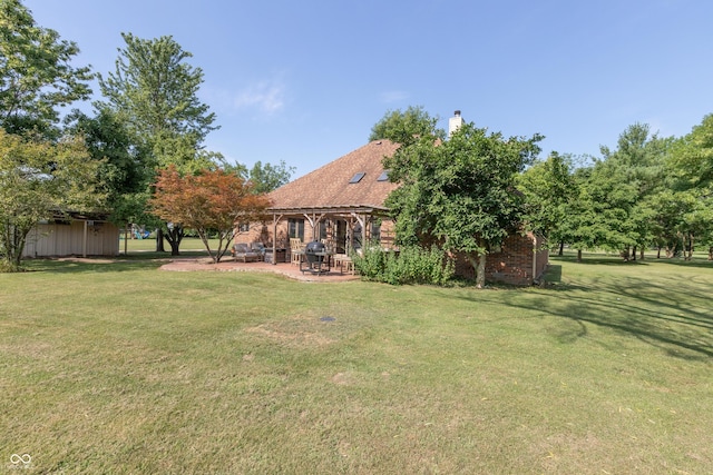9437 N County Road 225 E, Pittsboro, IN 46167 - view of grassy yard with a patio