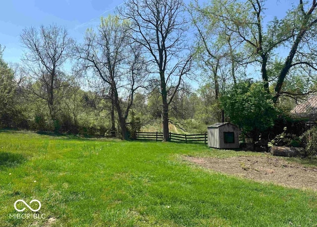98 E Smithville Rd, Bloomington, IN 47401 - view of yard featuring a storage shed