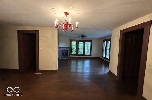 98 E Smithville Rd, Bloomington, IN 47401 - unfurnished living room featuring a chandelier and dark wood finished floors