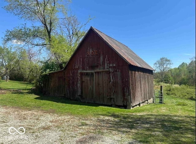 98 E Smithville Rd, Bloomington, IN 47401 - view of barn with a lawn