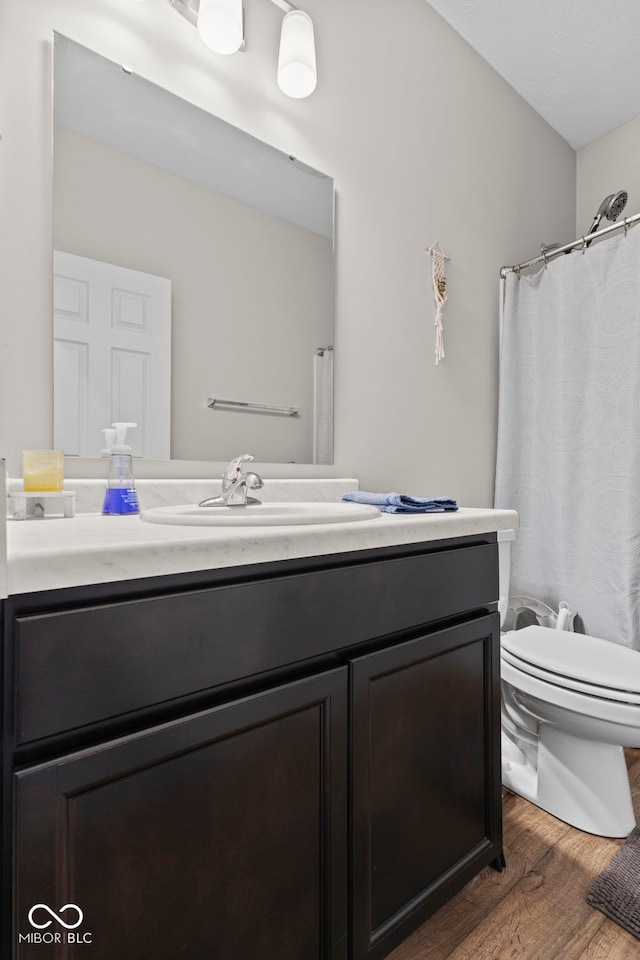 1448 Willow Tree Ln, Sheridan, IN 46069 - full bath with wood finished floors, vanity, and a shower with curtain