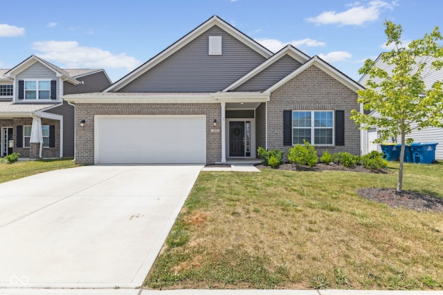 1448 Willow Tree Ln, Sheridan, IN 46069 - view of front of property featuring a garage, brick siding, concrete driveway, and a front yard