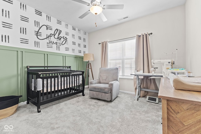 1448 Willow Tree Ln, Sheridan, IN 46069 - carpeted bedroom featuring a decorative wall, a nursery area, and a ceiling fan