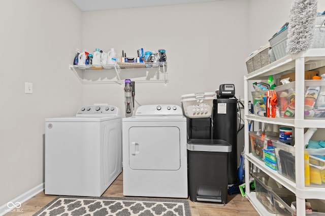 1448 Willow Tree Ln, Sheridan, IN 46069 - washroom with washer and dryer and wood finished floors