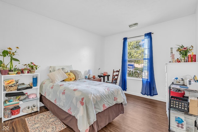 1058 Creekwood Ln, Franklin, IN 46131 - bedroom with wood finished floors and baseboards