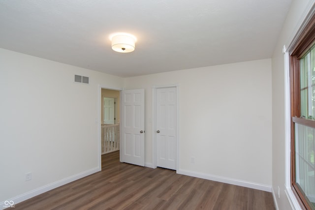 10630 Thorny Rdg Trce, Fishers, IN 46037 - spare room with wood finished floors and baseboards