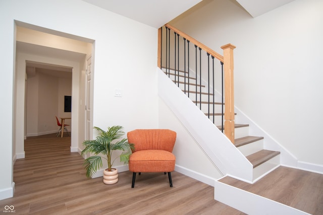 10630 Thorny Rdg Trce, Fishers, IN 46037 - stairway featuring wood finished floors
