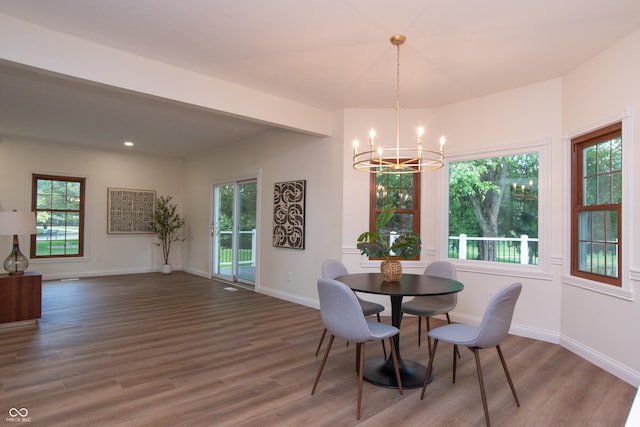 10630 Thorny Rdg Trce, Fishers, IN 46037 - dining area with a chandelier, wood finished floors, plenty of natural light, and recessed lighting