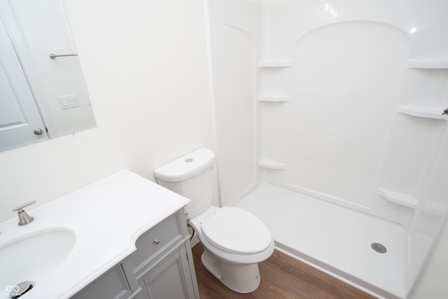 10630 Thorny Rdg Trce, Fishers, IN 46037 - full bath featuring a stall shower, wood finished floors, and vanity