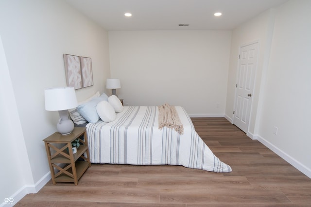 10630 Thorny Rdg Trce, Fishers, IN 46037 - bedroom with wood finished floors and recessed lighting