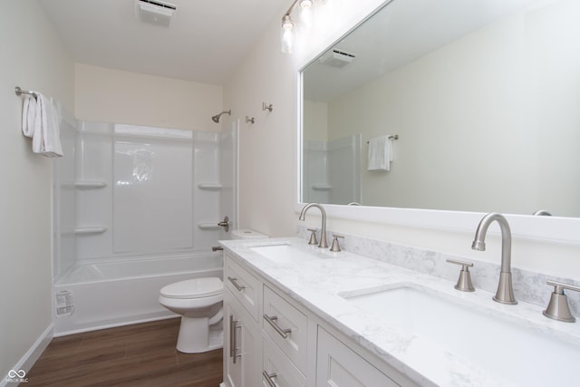 10630 Thorny Rdg Trce, Fishers, IN 46037 - bathroom with double vanity, bathing tub / shower combination, and wood finished floors