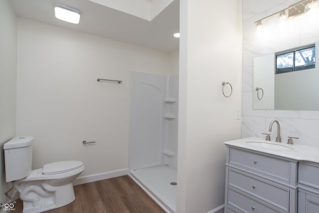 10630 Thorny Rdg Trce, Fishers, IN 46037 - bathroom featuring vanity, a shower, and wood finished floors
