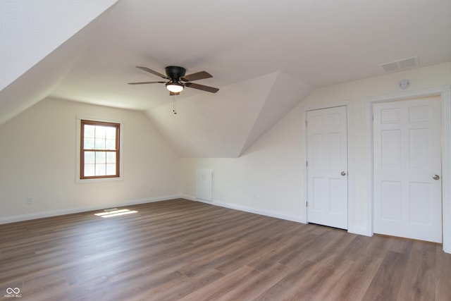 10630 Thorny Rdg Trce, Fishers, IN 46037 - additional living space with wood finished floors, a ceiling fan, and lofted ceiling