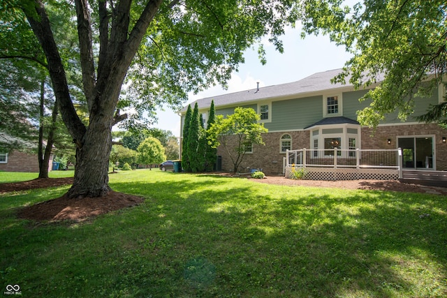 10630 Thorny Rdg Trce, Fishers, IN 46037 - view of grassy yard with a deck