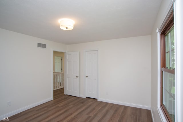 10630 Thorny Rdg Trce, Fishers, IN 46037 - unfurnished bedroom featuring wood finished floors and a closet