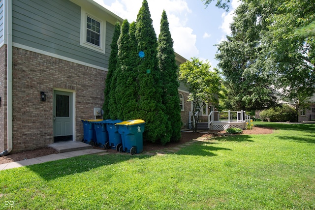 10630 Thorny Rdg Trce, Fishers, IN 46037 - view of green lawn with a deck