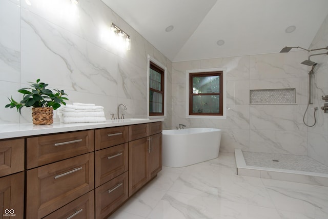 10630 Thorny Rdg Trce, Fishers, IN 46037 - bathroom featuring a freestanding bath, a walk in shower, tile walls, lofted ceiling, and vanity