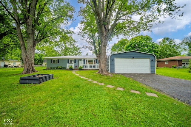 107 Pasadena Rd, Noblesville, IN 46062 - view of front of home featuring a garage, a front lawn, and an outdoor structure