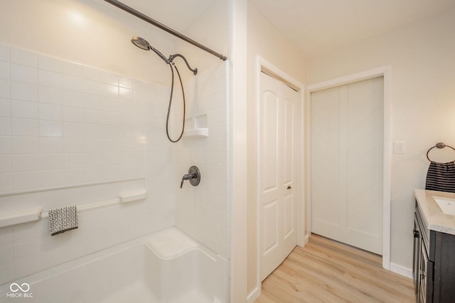 107 Pasadena Rd, Noblesville, IN 46062 - bathroom with a shower, vanity, and wood finished floors
