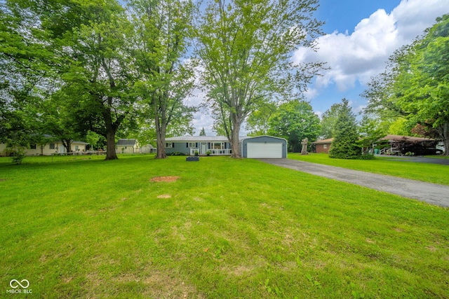 107 Pasadena Rd, Noblesville, IN 46062 - single story home with driveway, a front lawn, an outbuilding, and a garage