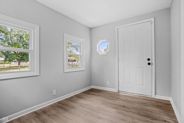 184 N Post Rd, Indianapolis, IN 46219 - unfurnished room featuring baseboards and wood finished floors