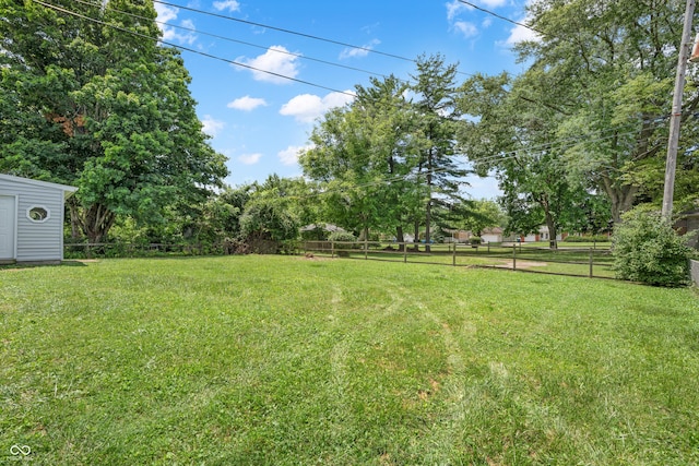 184 N Post Rd, Indianapolis, IN 46219 - view of yard with an outdoor structure