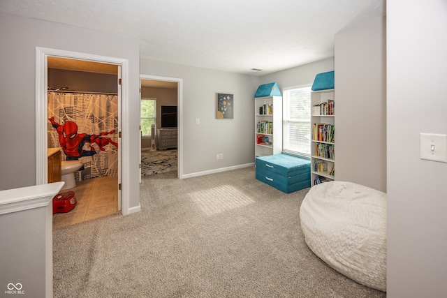 14126 Stonewood Pl, Fishers, IN 46037 - living area featuring carpet floors and baseboards