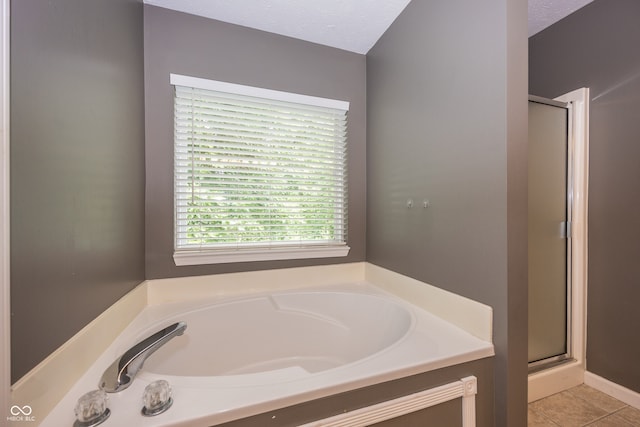 14126 Stonewood Pl, Fishers, IN 46037 - full bathroom featuring a stall shower, a bath, and tile patterned flooring