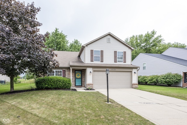 14126 Stonewood Pl, Fishers, IN 46037 - traditional home with an attached garage, driveway, a front lawn, and brick siding