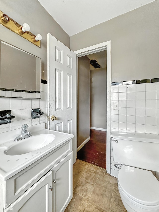 3505 N Emerson Ave, Indianapolis, IN 46218 - half bathroom with vanity and toilet