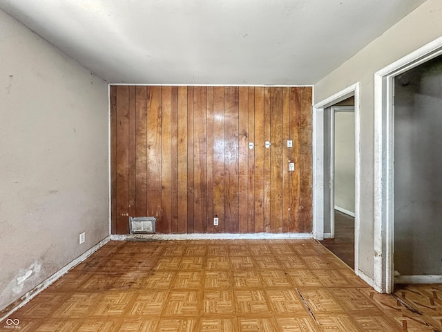 3505 N Emerson Ave, Indianapolis, IN 46218 - empty room featuring wood walls and baseboards