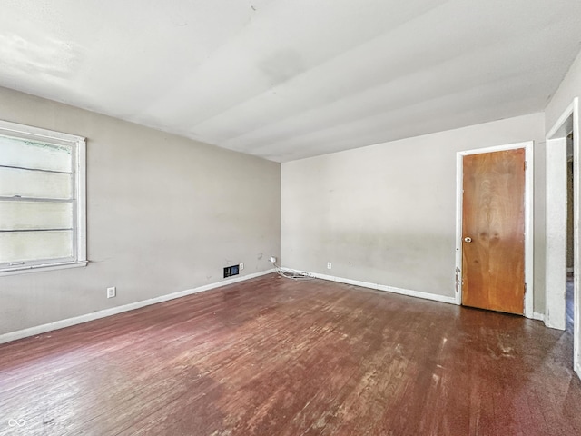 3505 N Emerson Ave, Indianapolis, IN 46218 - unfurnished room featuring wood finished floors and baseboards