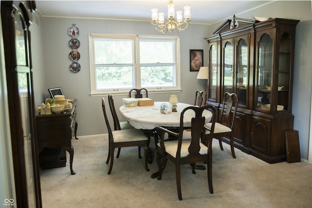 124 Georgton Ct, West Lafayette, IN 47906 - dining space featuring crown molding, a chandelier, and light colored carpet