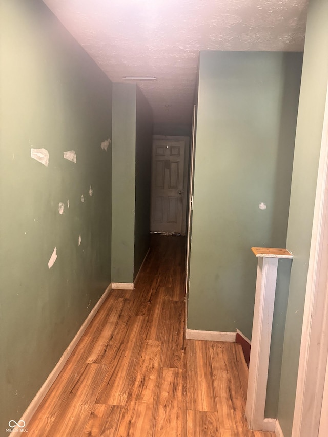 543 N Oakland Ave, Indianapolis, IN 46201 - corridor featuring wood finished floors and a textured ceiling