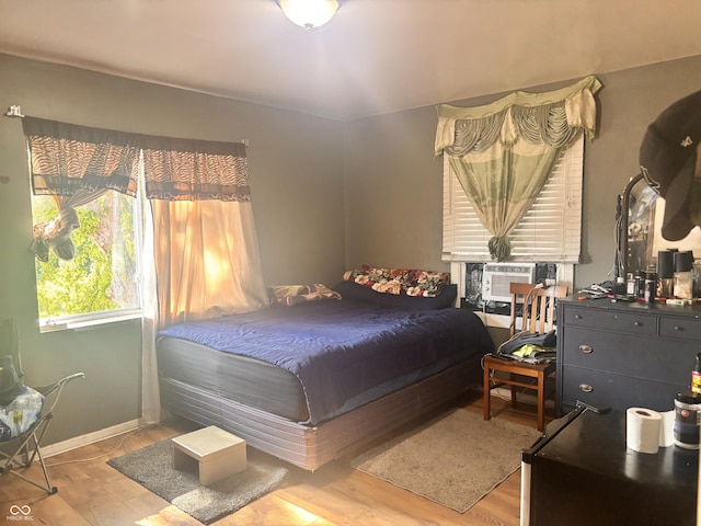 543 N Oakland Ave, Indianapolis, IN 46201 - bedroom featuring wood finished floors and cooling unit