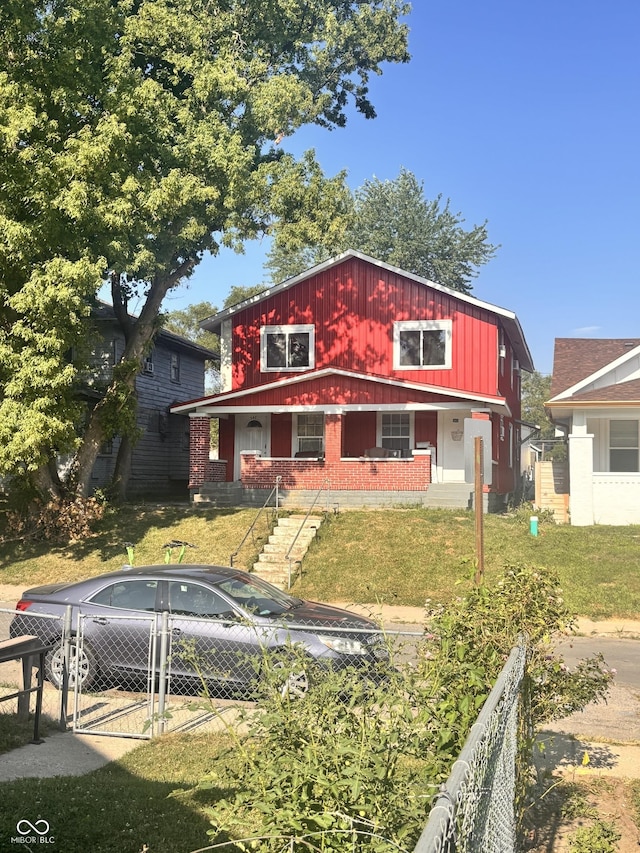 543 N Oakland Ave, Indianapolis, IN 46201 - view of front of home with brick siding and a gate