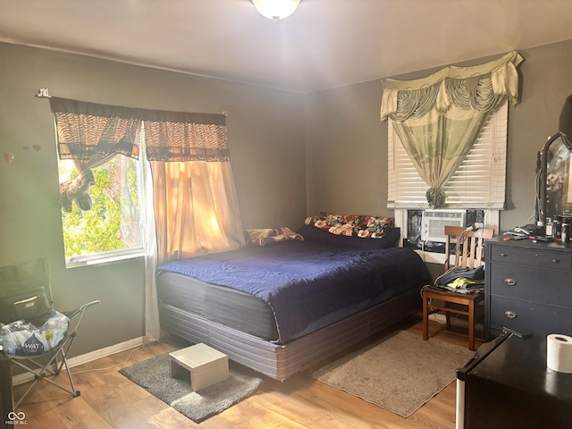 543 N Oakland Ave, Indianapolis, IN 46201 - bedroom featuring wood finished floors and cooling unit
