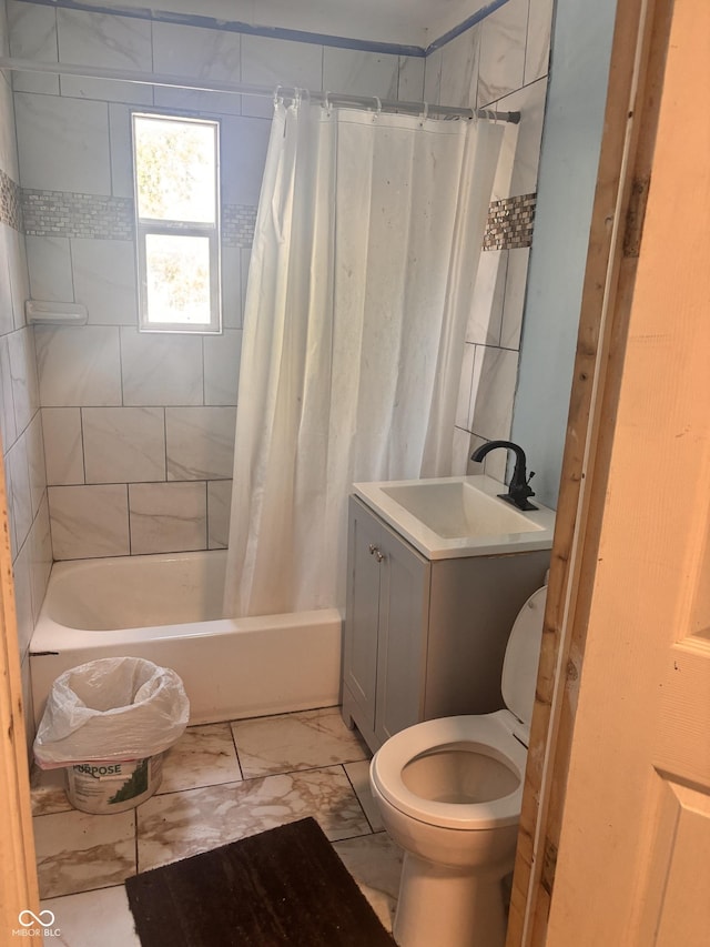 543 N Oakland Ave, Indianapolis, IN 46201 - full bathroom with shower / tub combo, marble look tile flooring, and vanity