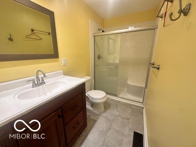 9490 N Keith Dr W, Columbus, IN 47203 - full bath featuring vanity and a stall shower