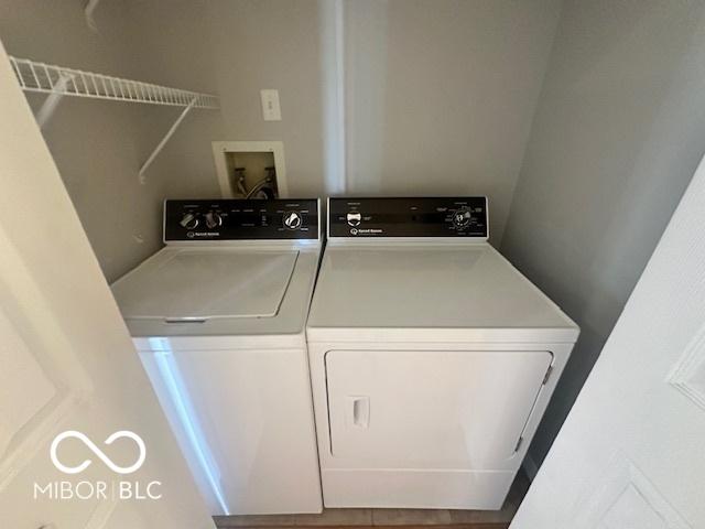 9490 N Keith Dr W, Columbus, IN 47203 - laundry area with washing machine and clothes dryer