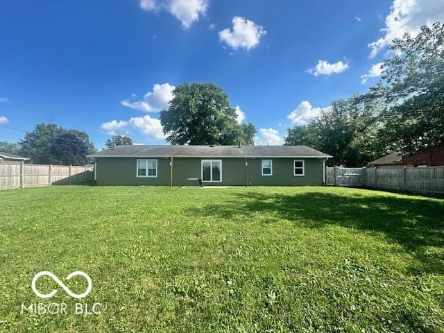 9490 N Keith Dr W, Columbus, IN 47203 - back of property with a fenced backyard