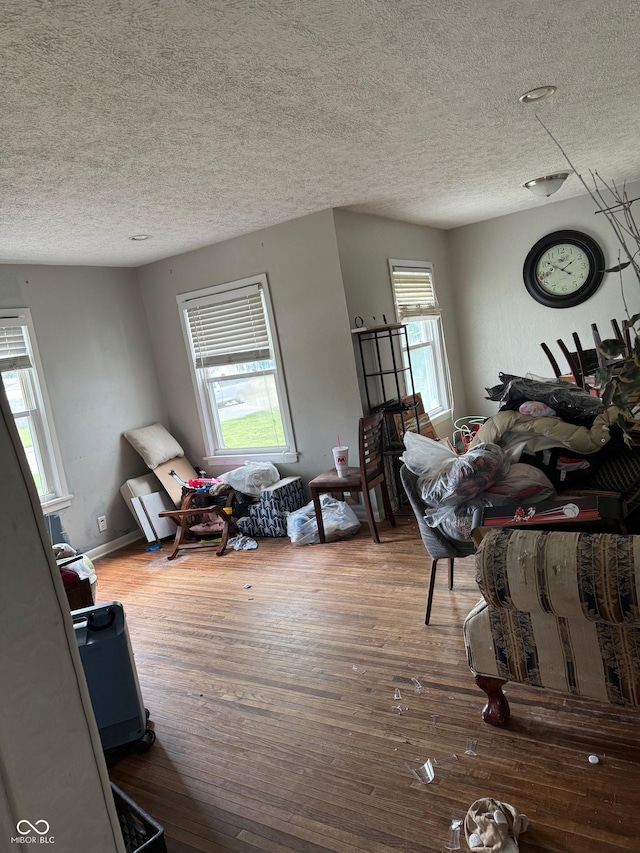 1918 14th St, Columbus, IN 47201 - living area featuring a textured ceiling and wood finished floors